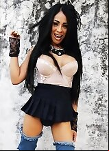 Trans slut in boots outdoors